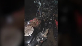 চলন্ত বাসের নিচে মোটরসাইকেল, প্রাণ গেল দুই আরোহীর